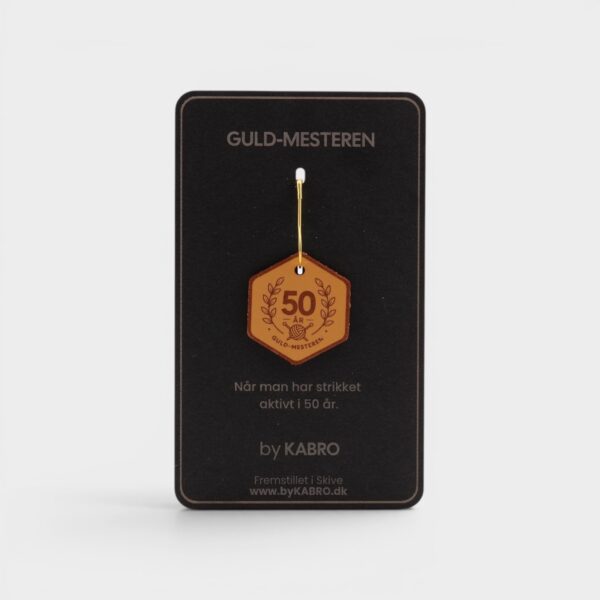 Guld-Mesteren - kortets forside Forsiden af kortet til strikkemærket Guld-Mesteren fra by KABRO