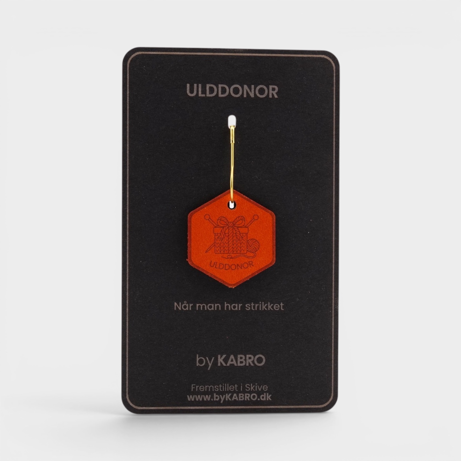 Ulddonor – strikkemærke på sort by KABRO-kort