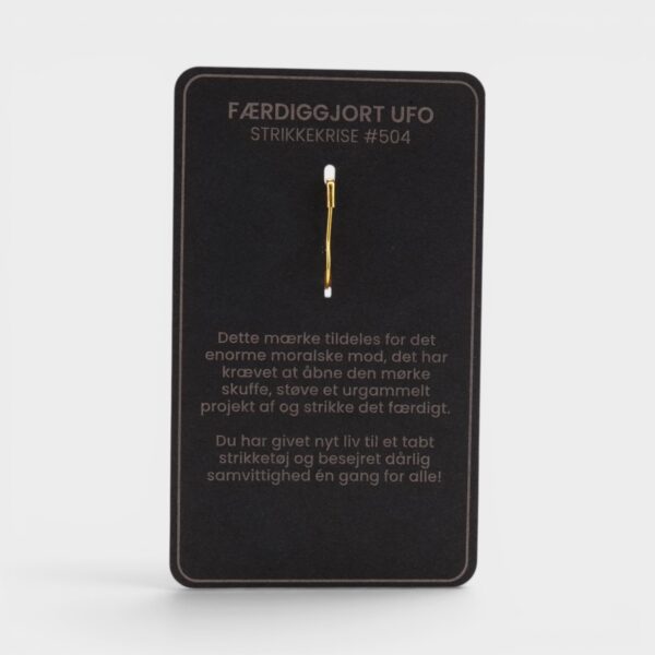 Bagsiden af kortet til strikkemærket UFO-Strikkeren fra by KABRO